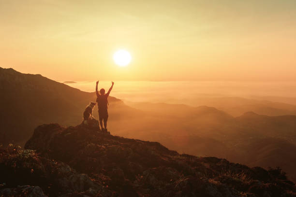 istock man with his dog hiking 1745275995