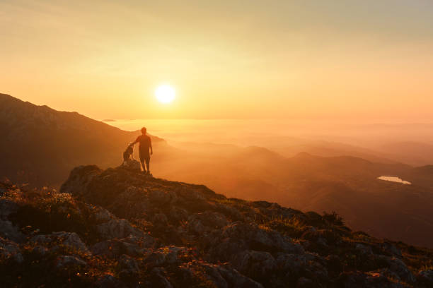 istock man with his dog hiking 1745275996