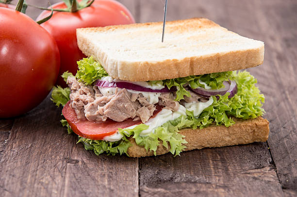 тунец сэндвич on wood - sandwich tuna tuna salad sandwich salad стоковые фото и изображения