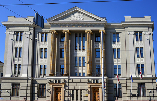 Riga, Latvia: Ministry of Foreign Affairs of Latvia headquarters - neoclassical façade with Ionic tetrastyle portico  on Riga's main street, Krisjana Valdemara Iela (formerly named after Gorky, Herman Göring and tzar Nicholas II). Frieze bearing a quotation by Roman historian and politician Gaius Sallustius Crispus 