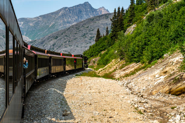 istock White Pass Summit excursion tour train in the mountains, Alaska, USA. 1745303007