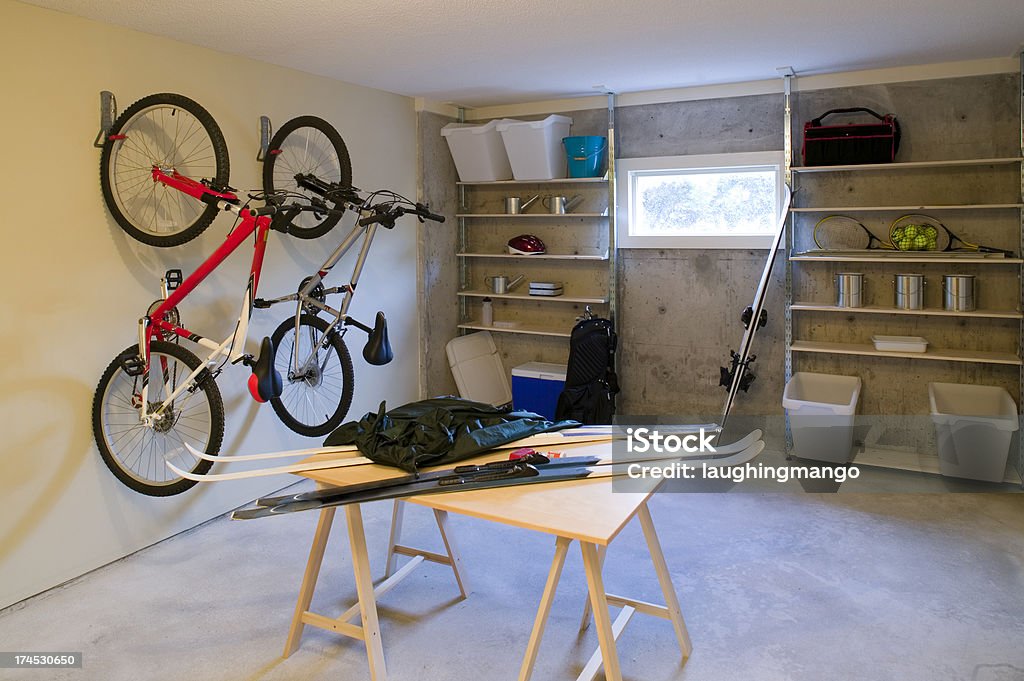 basement house clutter garage storage interior garage storage shelves Basement Stock Photo