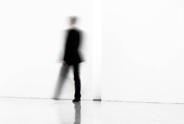istock Blurred businessmen walking indoors, motion blur 174530891