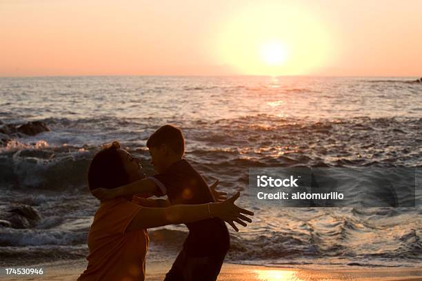 Moms Love Stock Photo - Download Image Now - Affectionate, Arms Outstretched, Beach