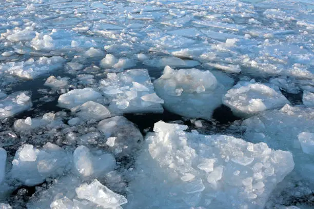 Broken Icy surface caused by ice breaker in frozen water