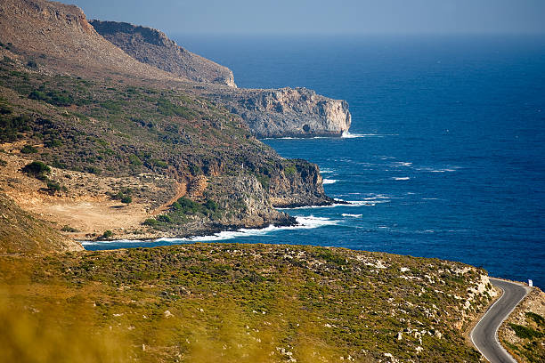 istock Rocky coastline with winding road 174531275