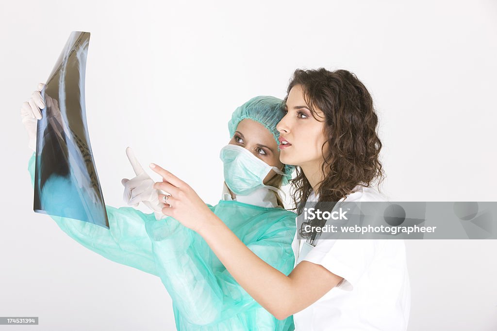 Lavoro di squadra medica - Foto stock royalty-free di Adulto