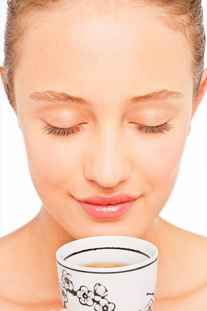 istock Young woman drinking tea 174531628