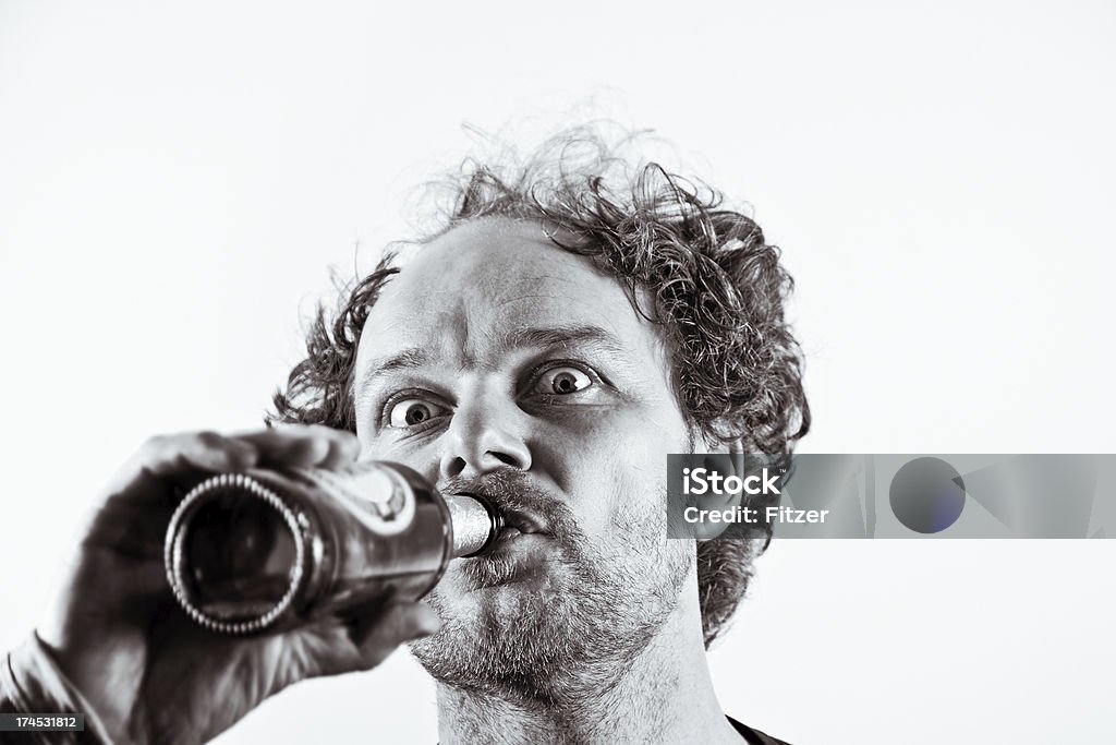 Uomo e birra - Foto stock royalty-free di Birra