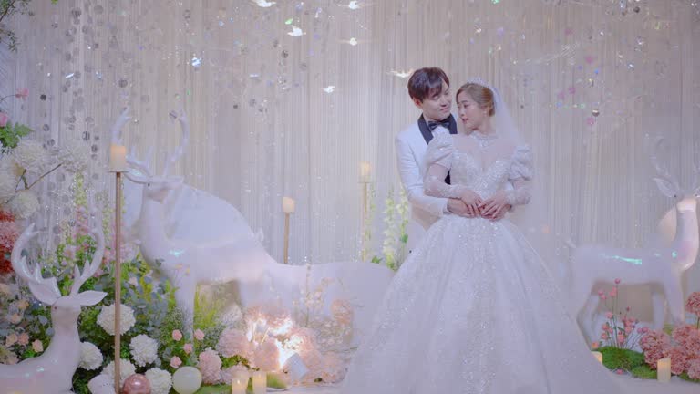 Bride and groom are smiling together on their wedding day.