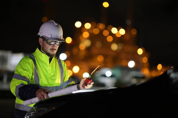istock The Specialist electrical engineer communicated with the team via walkie-talkie at night against the  light of bokeh in the background 1745403899