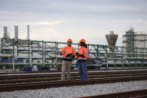 istock Railway Engineer with Orange safety jacket and helmet work audit 1745409048