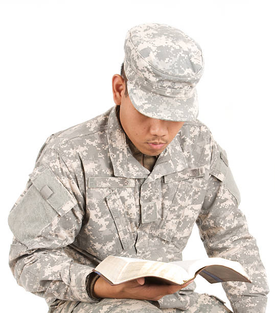 istock army man reading his bible 174543681