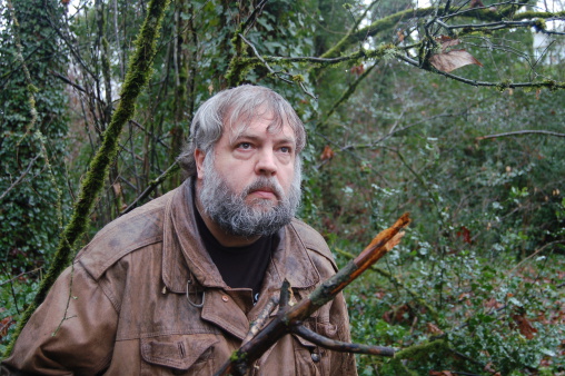 Bearded hermit tracking through the wilderness.Similar mountain man shots: