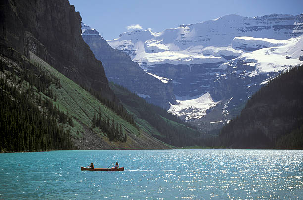 Caneoing on Lake Louise stock photo
