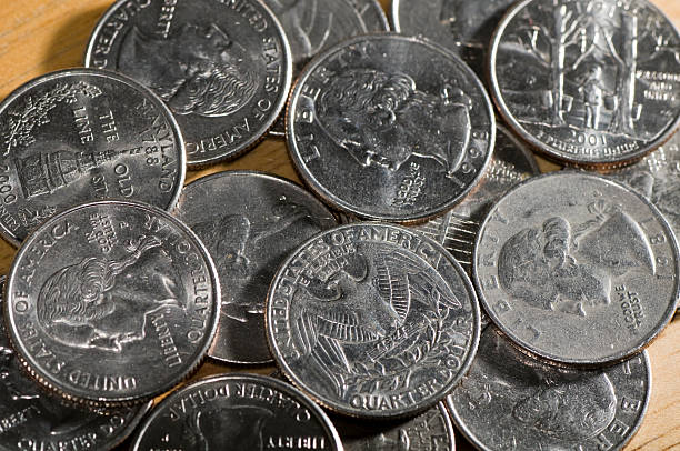 istock Pile of Quarters 174546031