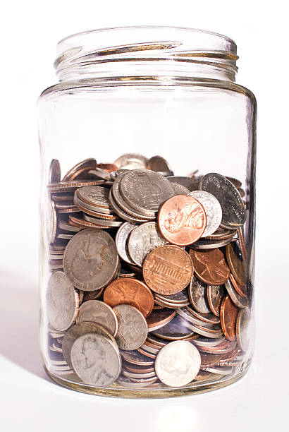 istock money jar w/ clipping path 174546116