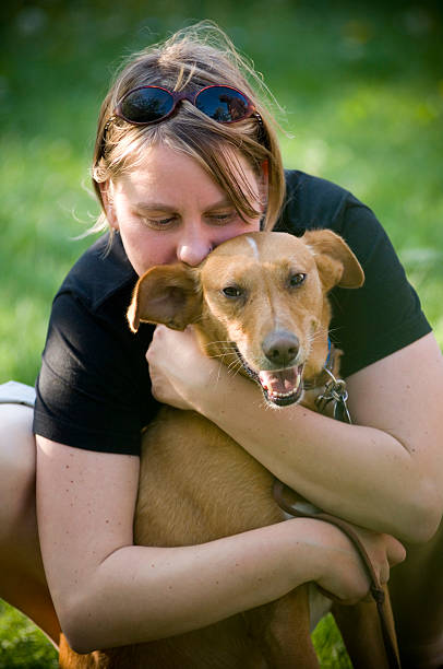 istock Woman and her dog 174546131