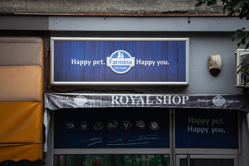 Picture of a sign with the logo of Farmina Pet foods on display in front of a pet shop of Belgrade, Serbia. Farmina Pet foods is a brand specializing in pet food and supplies.