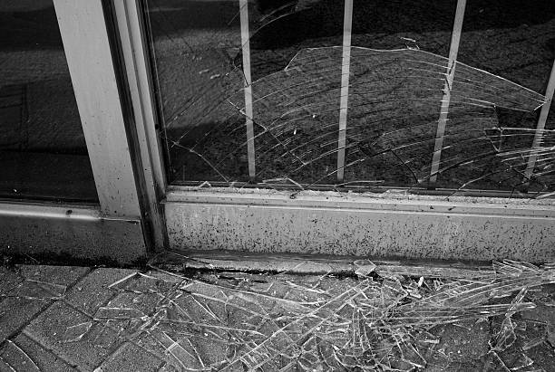 Broken glass storefront stock photo