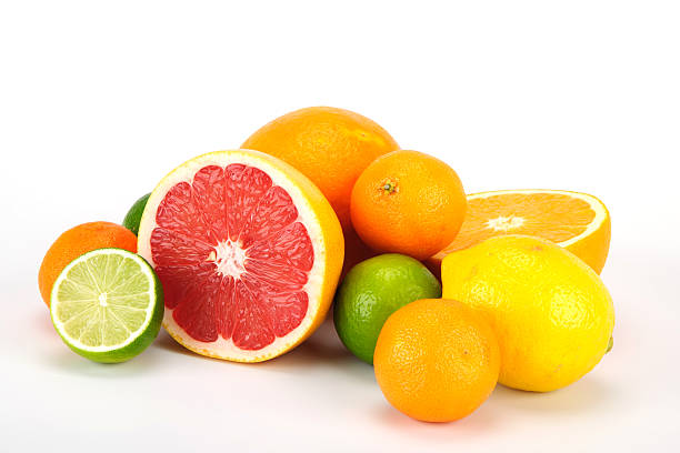 Bunch of fruits Bunch of fresh citrus fruits. Lemon,orange,mandarin,grape,lime. valencia orange photos stock pictures, royalty-free photos & images