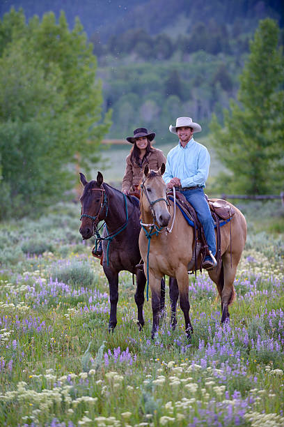Young American Western Couple On Horses
