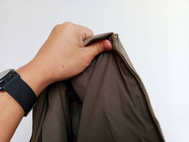 istock Photo of hands posing holding a jacket 1745541150