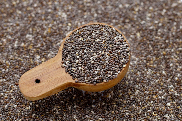 istock Chia seeds with wooden spoon 1745598300