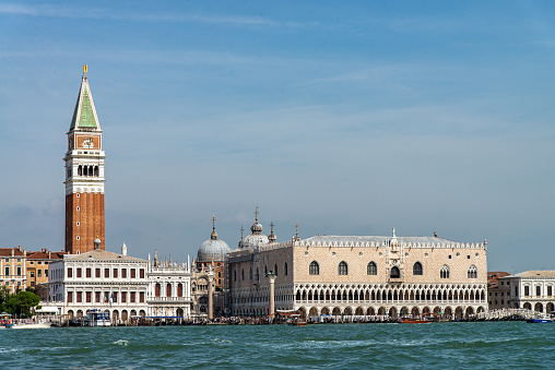 View of Doge´s Palace, Campanile and coastline from the Grand Canal at Venice, Italy. \nThe city of Venice is an Unesco World Heritage site and it is visited daily by thousands of tourists from all over the world.