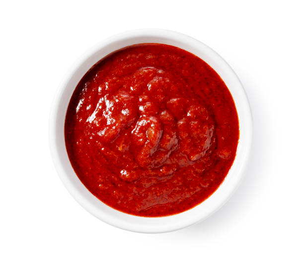 istock Tomato sauce in a bowl on a white background. 1745611661