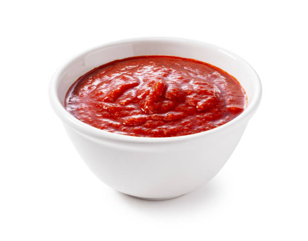 istock Tomato sauce in a bowl on a white background. 1745611662