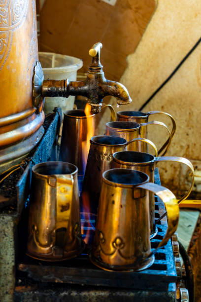 istock Traditional tea brewing kettle and cups in Fez, Morocco 1745663241