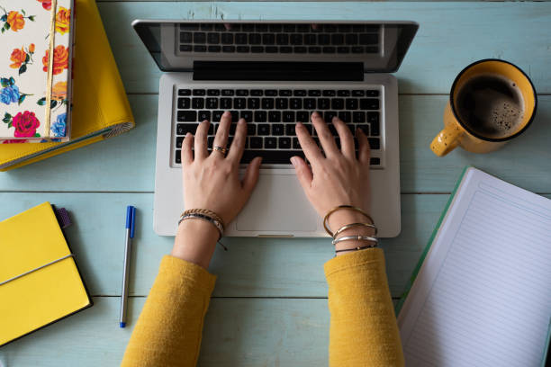 istock Woman working on her computer in the morning. 1745666371
