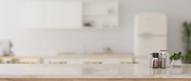 istock A luxury white marble kitchen countertop with a burred background of a modern white kitchen. 1745668928