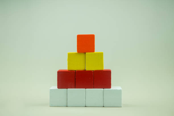 istock Colorful cubes wood cube arranged in pyramid shape 1745668951