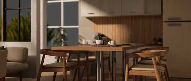 istock A modern minimal wooden dining table with armchairs in a spacious modern Scandinavian kitchen. 1745687907