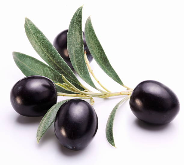 istock Ripe black olives with leaves. 174569080