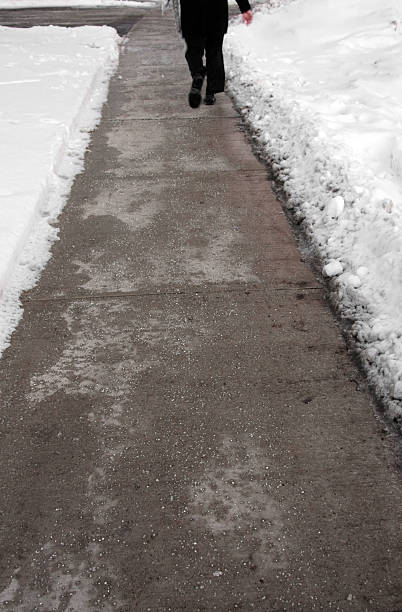 istock Plowed and salted winter street 174569530