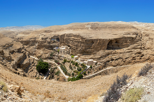 Judean Desert, Israel - August 12, 2023: St. George Greek Orthodox Monastery, a monastery located in the Judean Desert Wadi Qelt, in the eastern West Bank