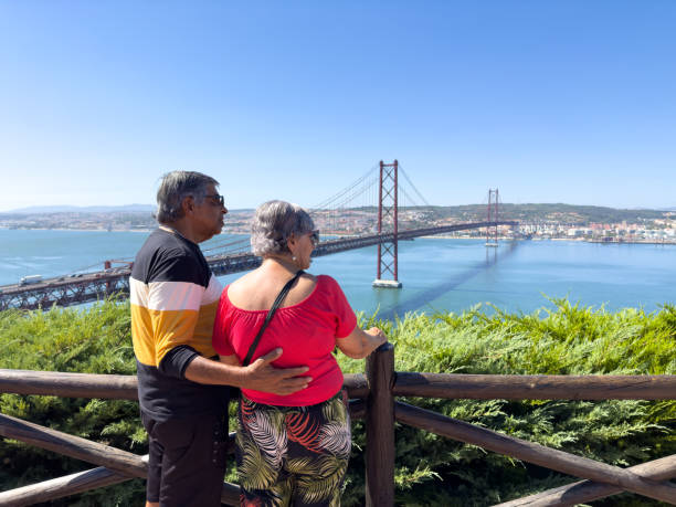 istock Elderly couple observes landscape from viewpoint 1745717715
