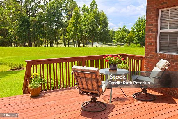 Backyard Deck Next To A Green Field Stock Photo - Download Image Now - Deck, Railing, Wood - Material