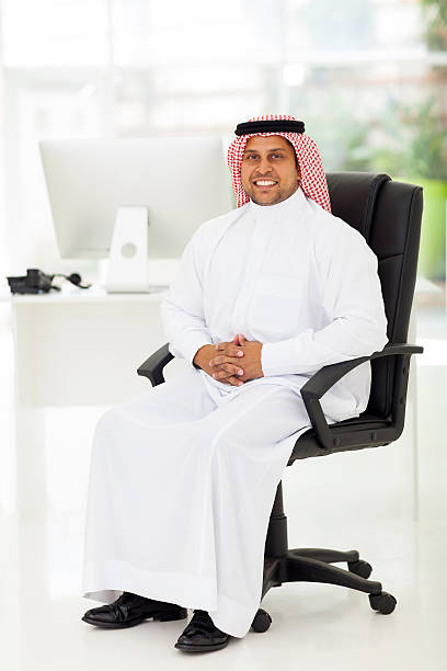 istock middle eastern businessman sitting in office 174576377