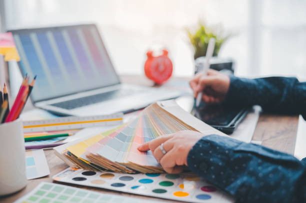 istock Graphic designer architects who work with laptops and color comparison tables for design work. 1745767885