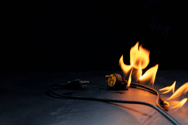 istock An electrical plug fire is caused by a short circuit of electrical current. Concept of prevention of danger. Using non-standard equipment, damaged equipment 1745774891