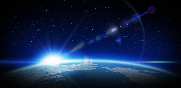 Sunrise in space Earth and rising Sun with lens flare effect horizon over land photos stock pictures, royalty-free photos & images