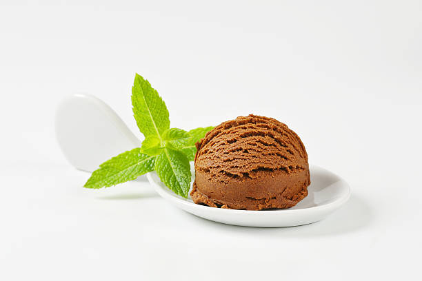 istock Scoop of chocolate ice cream in a plastic spoon 174578569