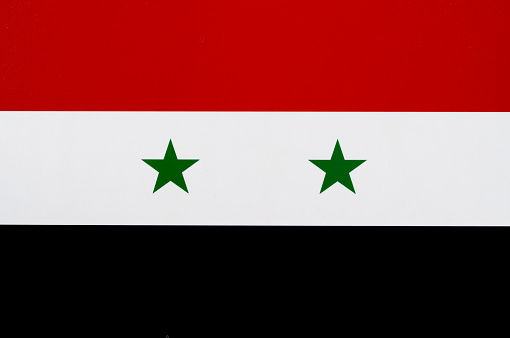 Close up of Syrian flag.