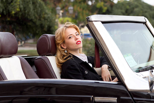 istock girl in an old car 174580987