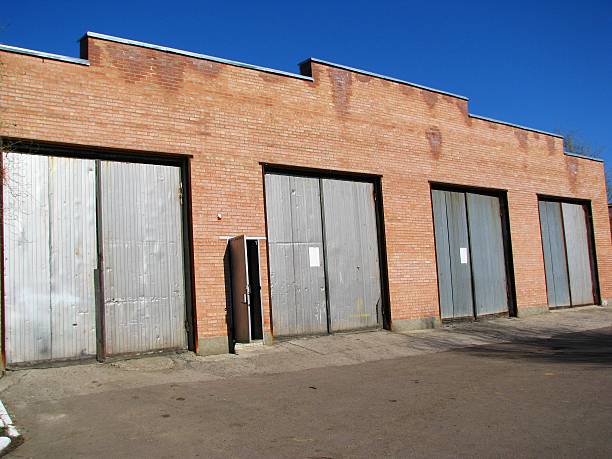 istock Metal gates of brick garage boxes 174581919