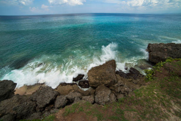 istock rocks and waves on the beach 1745830158